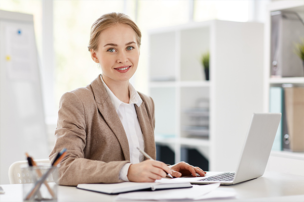 Woman working in account management for an insurance agency